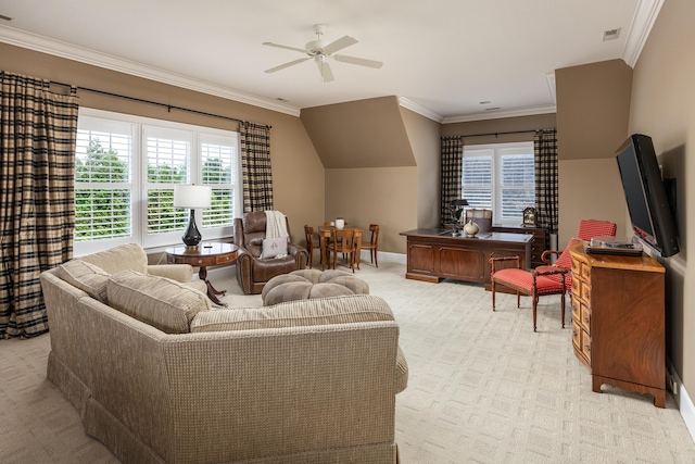 living room featuring ceiling fan, light colored carpet, a wealth of natural light, and ornamental molding