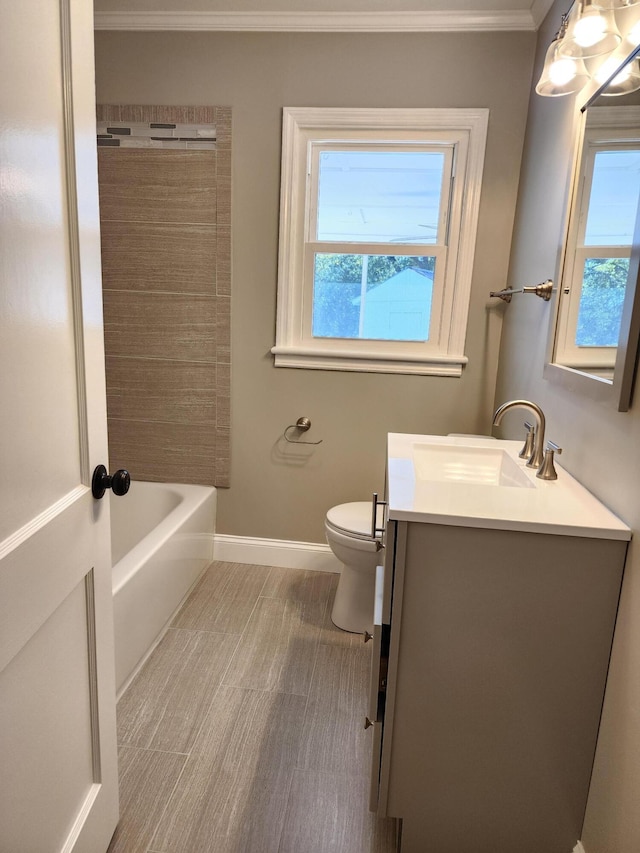 full bathroom with vanity, toilet, ornamental molding, and shower / tub combination