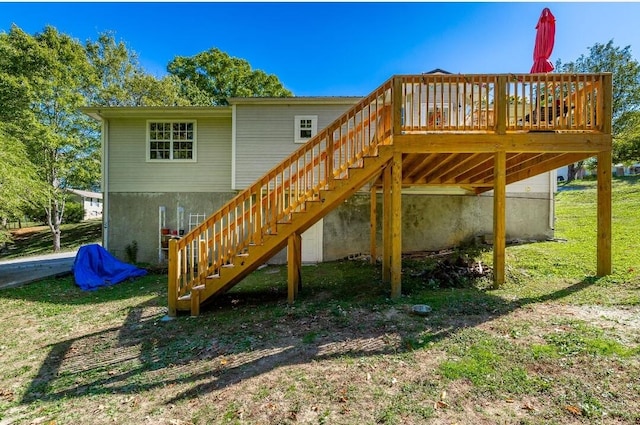 back of property with a deck