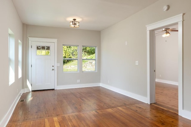 entryway with hardwood / wood-style floors and ceiling fan