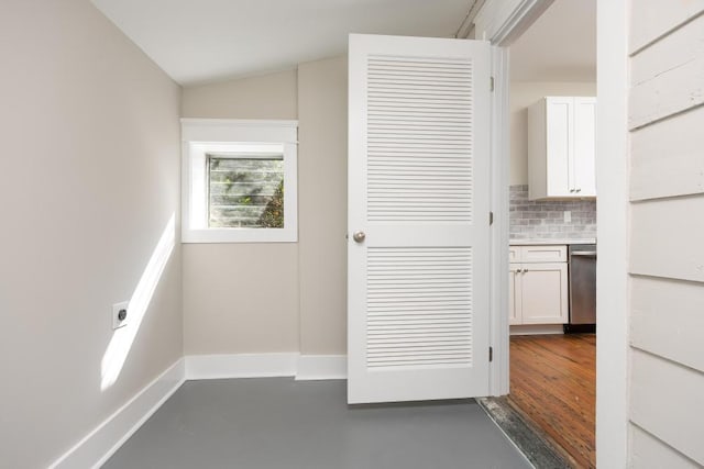 interior space featuring lofted ceiling