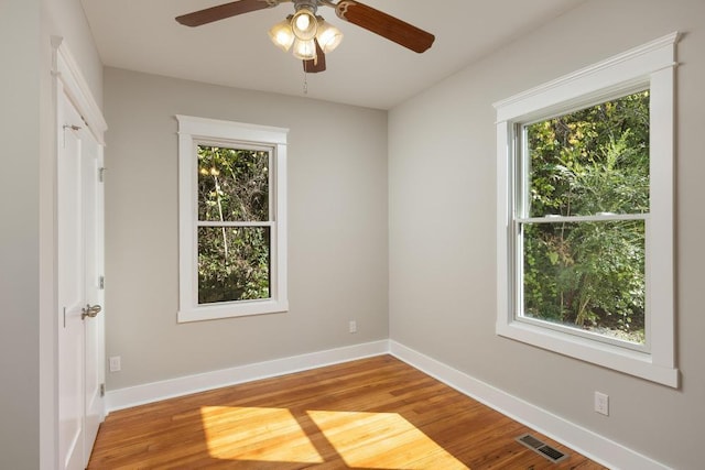 719 Federal St, Chattanooga, TN 37405 - empty room featuring a ceiling fan, visible vents, wood finished floors, and baseboards
