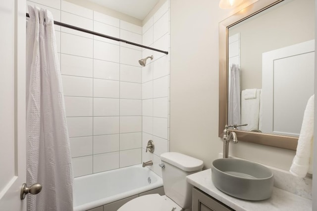 full bathroom featuring vanity, toilet, and shower / bath combo with shower curtain