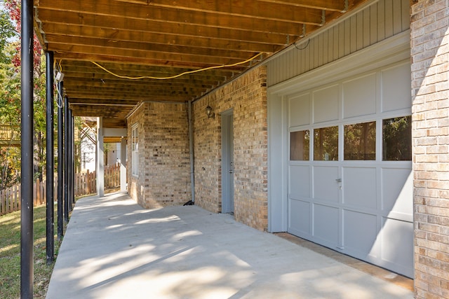 view of patio / terrace with a garage