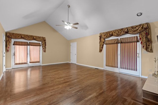 unfurnished living room featuring high vaulted ceiling, wood-type flooring, and ceiling fan