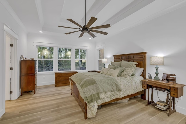 bedroom with light hardwood / wood-style floors and ceiling fan