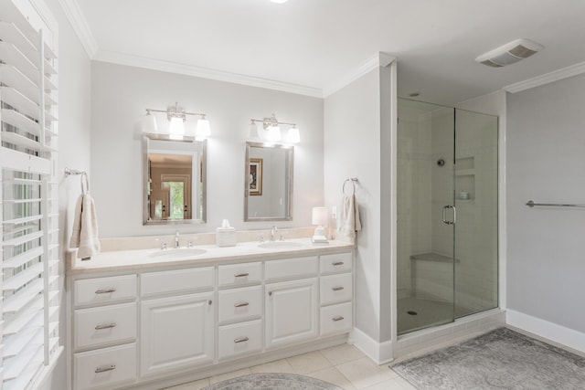 bathroom with vanity, crown molding, tile patterned floors, and walk in shower