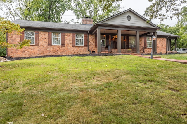 view of front facade featuring a front yard and a porch