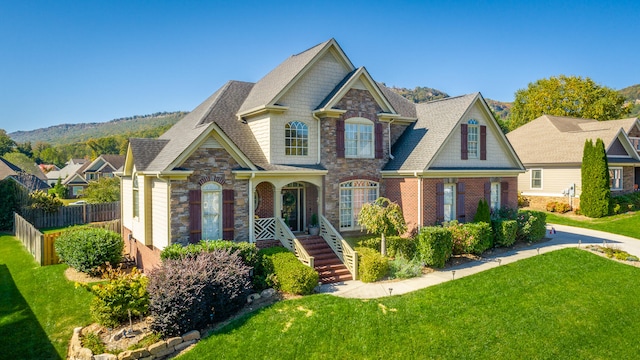 craftsman house featuring a front lawn