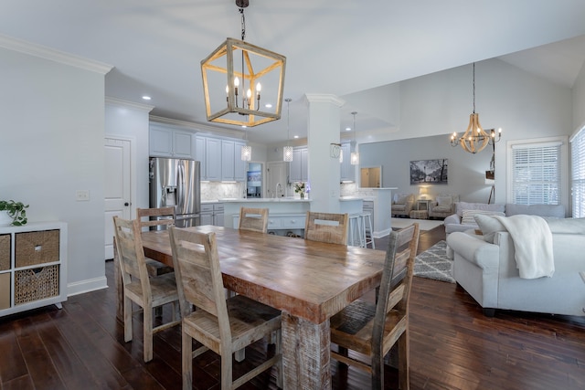 dining space featuring high vaulted ceiling, dark wood-type flooring, and crown molding