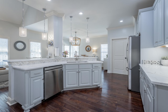 kitchen featuring white cabinetry, appliances with stainless steel finishes, sink, and dark hardwood / wood-style flooring