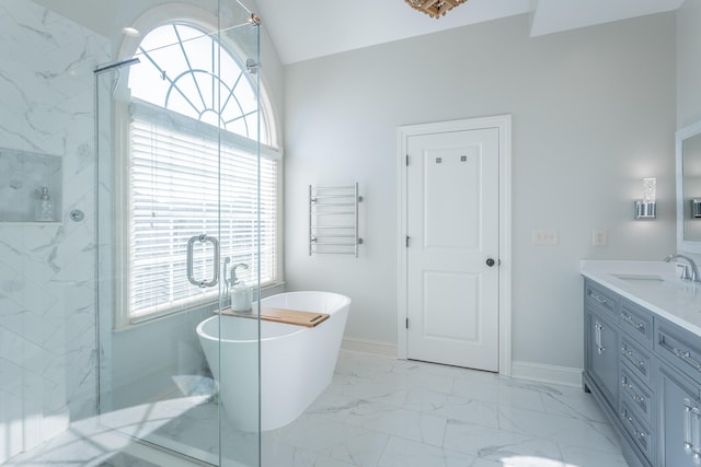 bathroom featuring vanity and plus walk in shower