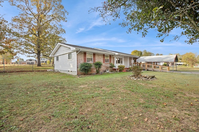 ranch-style house featuring a gazebo and a front lawn