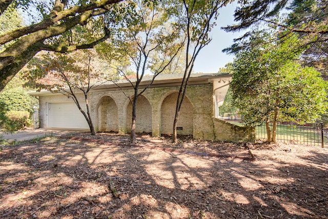 view of front of home with a garage