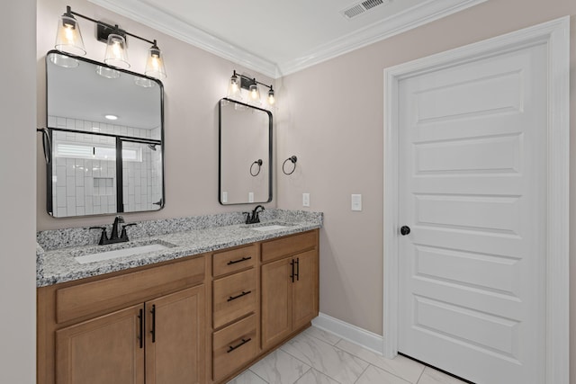 bathroom with vanity, a shower with shower door, and crown molding