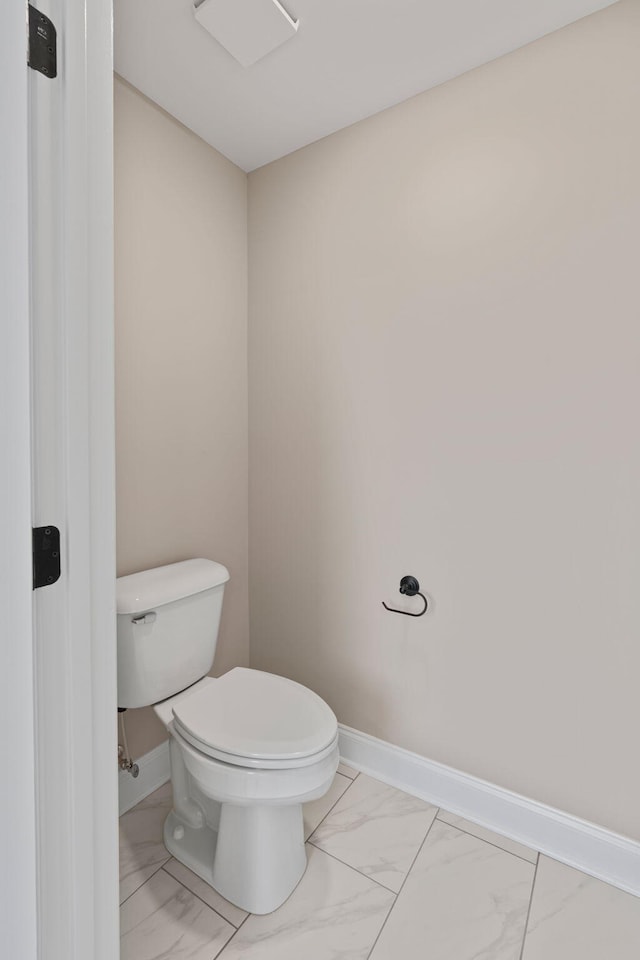 bathroom featuring toilet