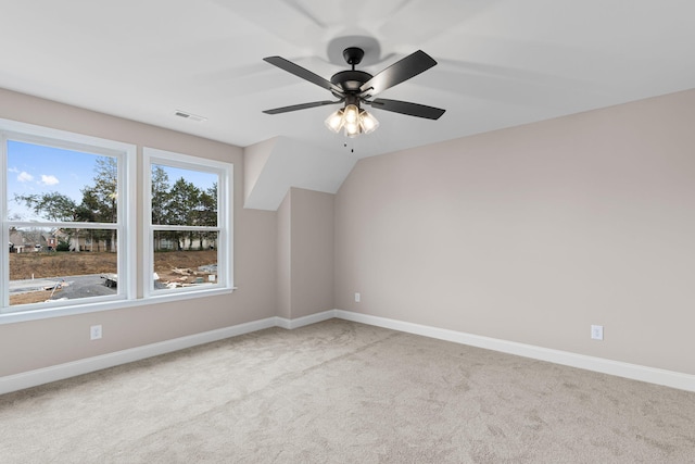 bonus room featuring light carpet, ceiling fan, and lofted ceiling