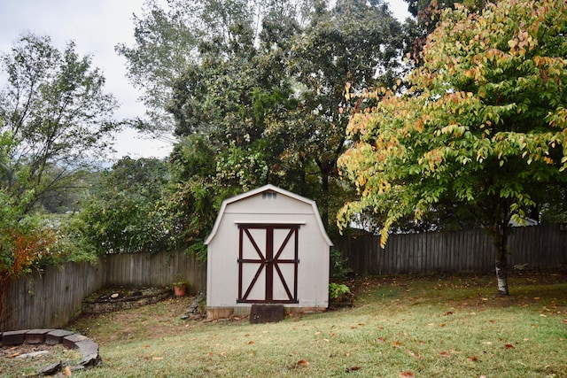 view of outdoor structure with a lawn