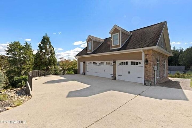 view of property exterior with a garage