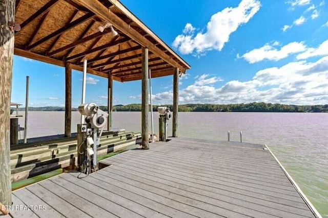 view of dock with a water view