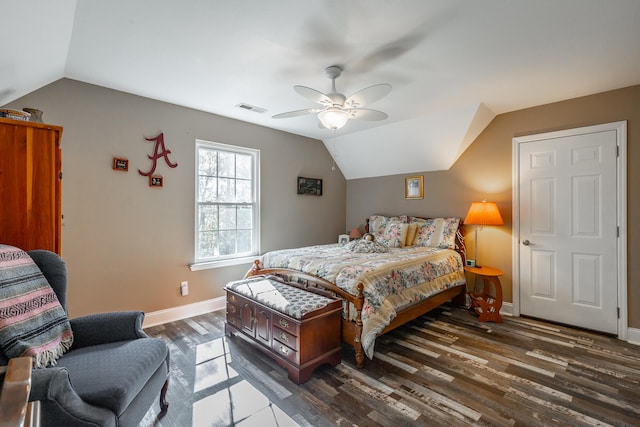 bedroom featuring dark hardwood / wood-style flooring, ceiling fan, and lofted ceiling