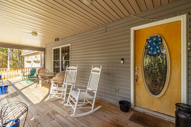 deck featuring covered porch