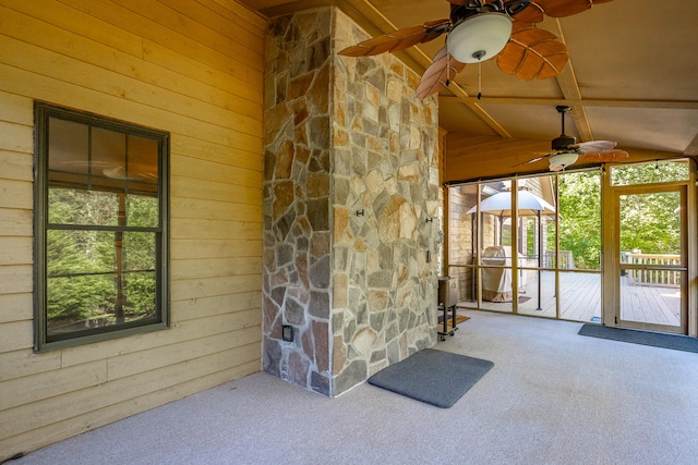 interior space featuring ceiling fan