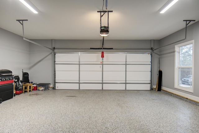 garage featuring a garage door opener