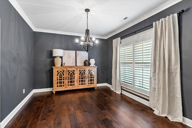 dining space featuring an inviting chandelier, crown molding, a healthy amount of sunlight, and dark hardwood / wood-style flooring