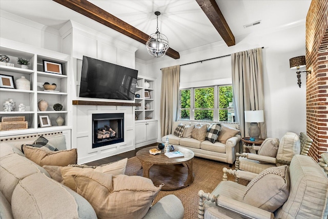 living room with hardwood / wood-style flooring and beamed ceiling