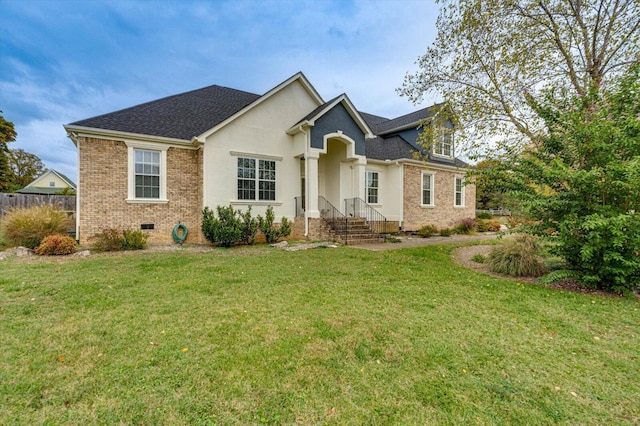 view of front of house with a front lawn