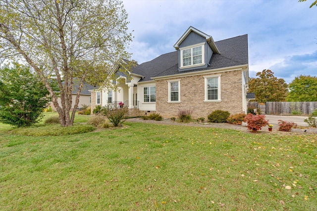 view of front of home featuring a front lawn