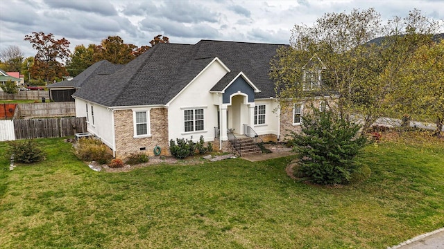 view of front of home with a front yard