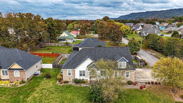 birds eye view of property featuring a mountain view