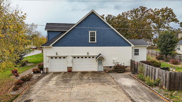 view of front of home with a garage