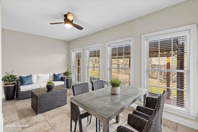 dining area with ceiling fan