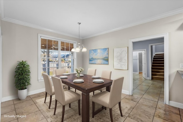 dining room featuring an inviting chandelier and crown molding