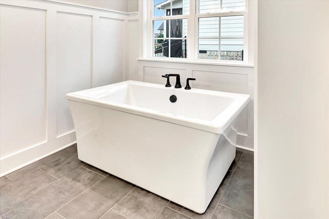 bathroom with tile patterned floors