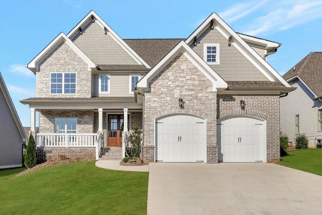 craftsman inspired home featuring a front lawn, brick siding, stone siding, concrete driveway, and covered porch