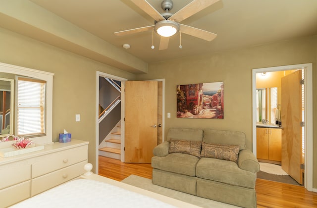 bedroom featuring light hardwood / wood-style floors and ceiling fan