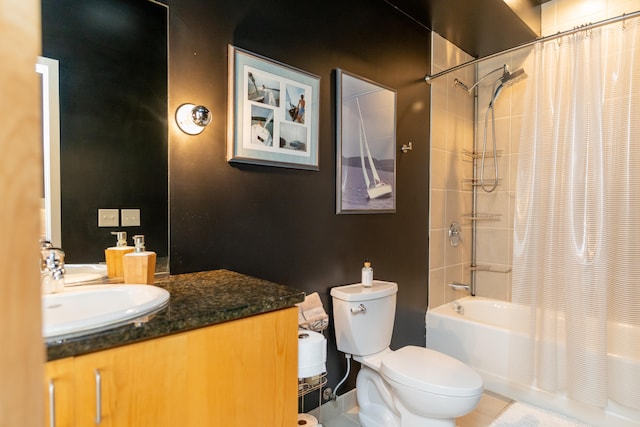 full bathroom featuring vanity, tile patterned flooring, toilet, and shower / bathtub combination with curtain