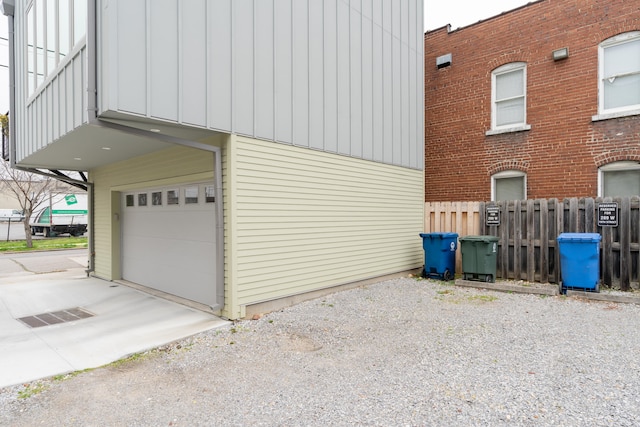 view of side of property with a garage