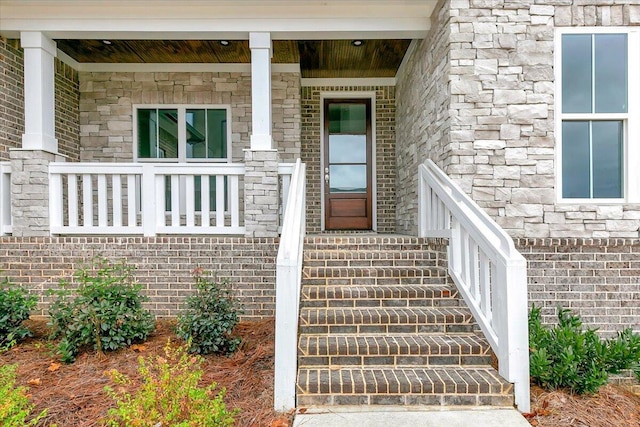 property entrance with covered porch