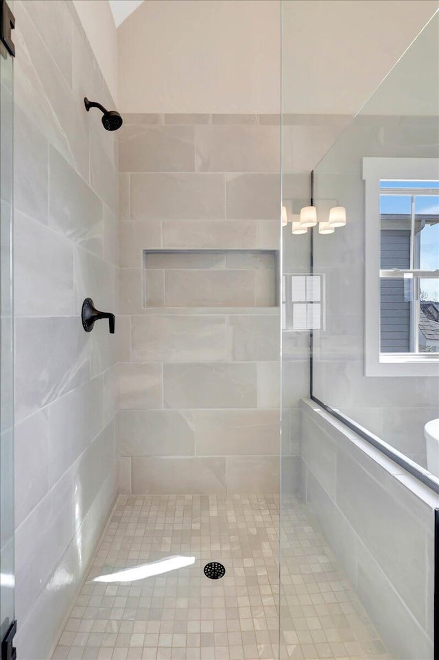 bathroom featuring an enclosed shower