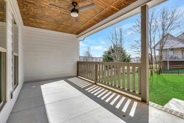 balcony with ceiling fan and a patio area