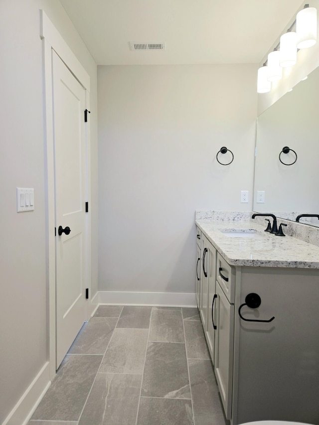 bathroom featuring vanity