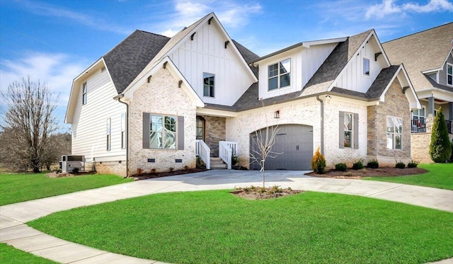 view of front of home featuring a garage and a front lawn