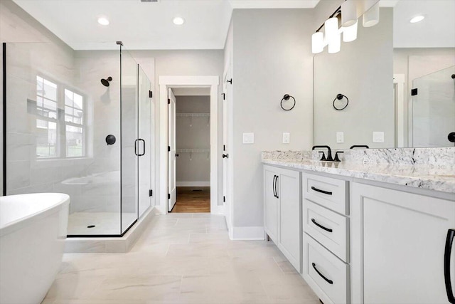 bathroom with vanity and plus walk in shower