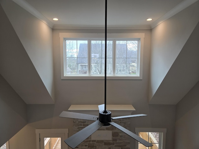 details featuring ceiling fan and crown molding