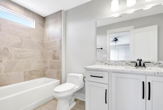 bathroom featuring toilet, visible vents, tub / shower combination, and vanity